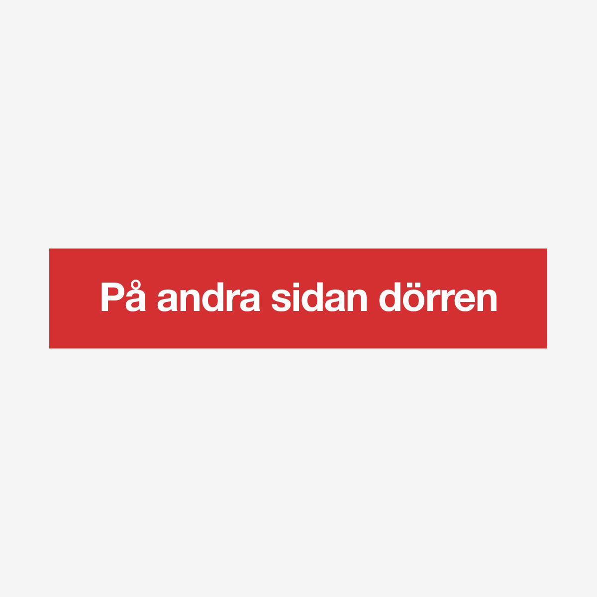 På andra sidan dörren en Skylt från Nordisk skylt